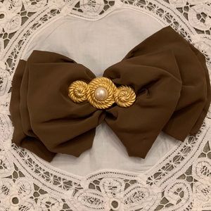 Vintage Kirks Folly hair accessories